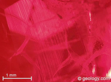 curved striae through quench-crackled synthetic ruby