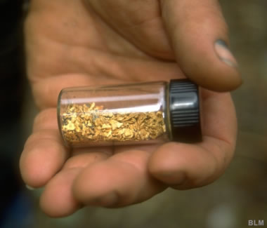 vial of gold flakes