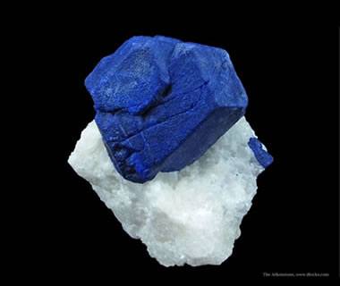 Lazurite crystals on marble - iRocks