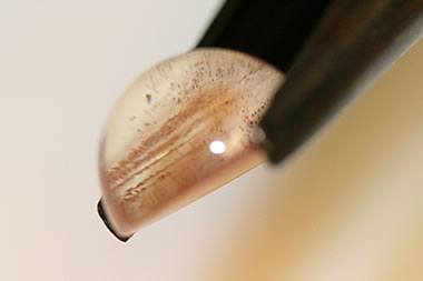 sunstone cabochon with copper layers